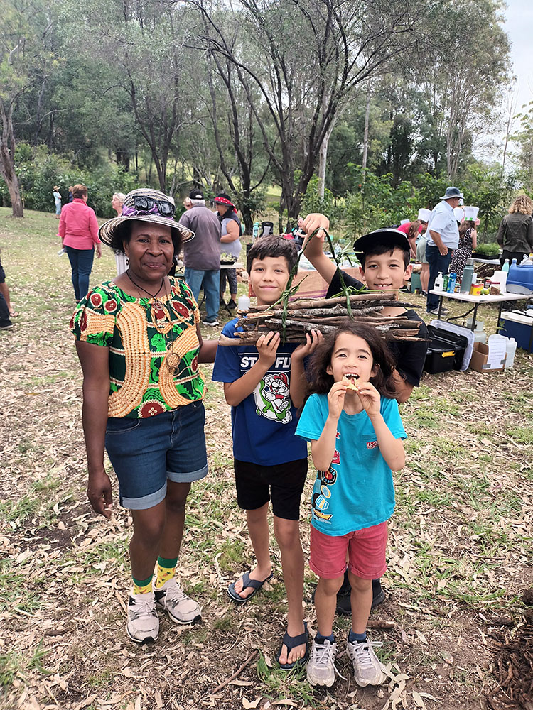 Veronica Tano sharing her bushcraft skills with the kids at the ‘Cook-Off’ Event